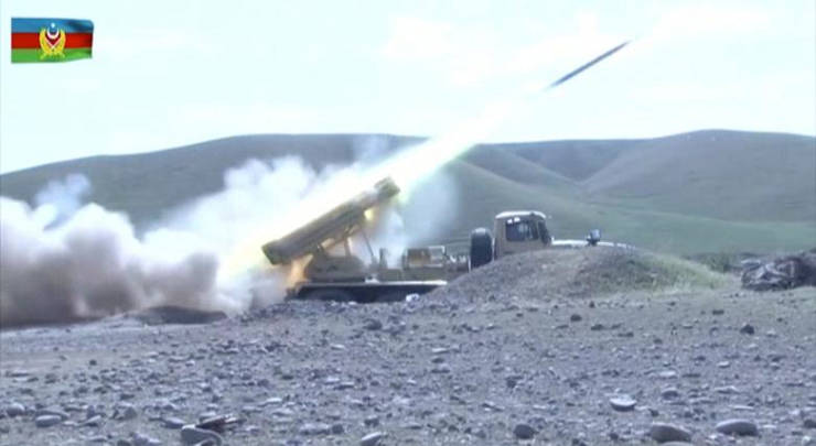 A multiple rocket launcher of the Azeri armed forces performing strikes during clashes over the breakaway region of Nagorno-Karabakh in an unknown location in Azerbaijan. Image released September 30. PHOTO: REUTERS