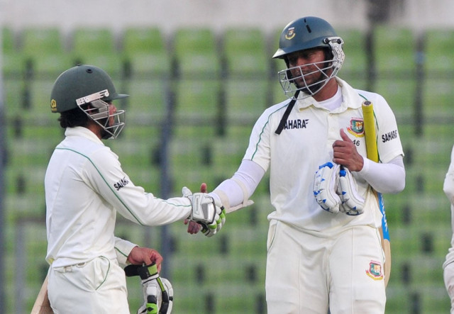 bangladesh batsman shakib al hasan r shakes hands with teammate mominul haque at close of play on the fourth day of the second test match between bangladesh and new zealand photo afp bangladesh batsman shakib al hasan r shakes hands with teammate mominul haque at close of play on the fourth day of the second test match between bangladesh and new zealand photo afp