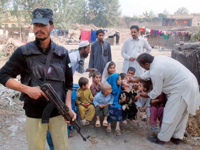children receive polio vaccination at doranpur near peshawar islamabad motorway on world polio day photo sameer raziq express children receive polio vaccination at doranpur near peshawar islamabad motorway on world polio day photo sameer raziq express