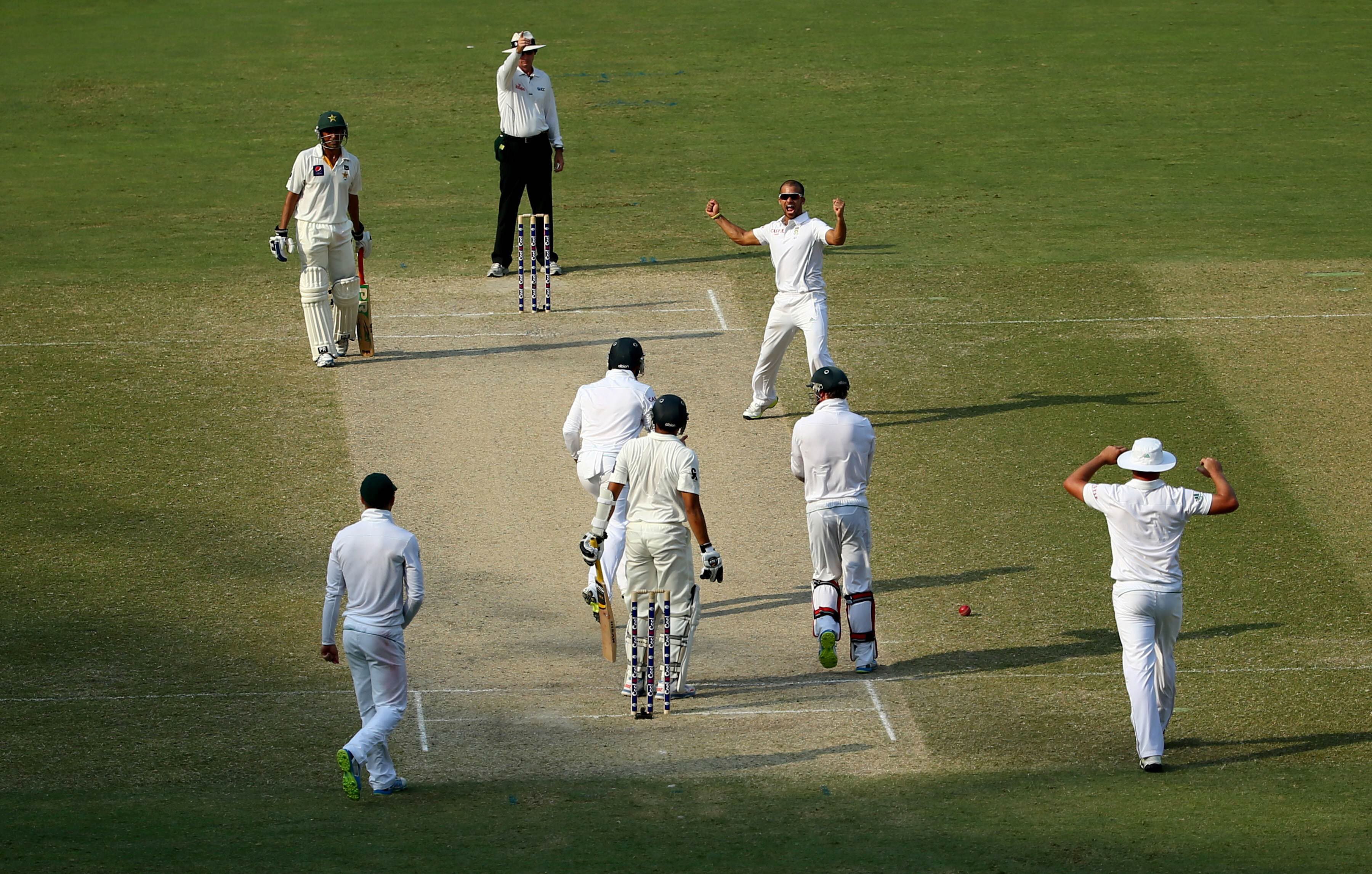 south african bowler jp duminy c top celebrates after taking the wicket of azhar ali of pakistan during the third day of the second test cricket match between pakistan and south africa in dubai on october 25 2013 photo afp