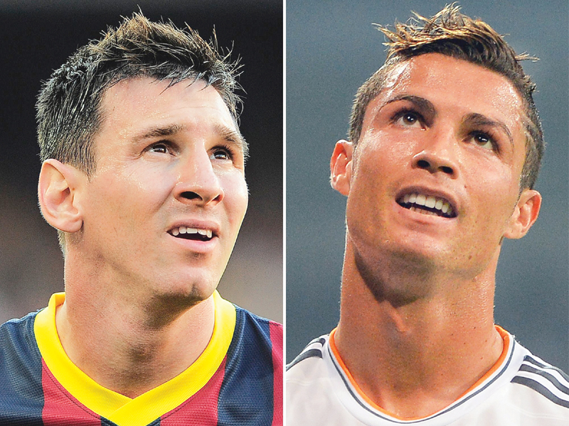 lionel messi and cristiano ronaldo will go head to head for the first time this season in the el clasico today photo afp