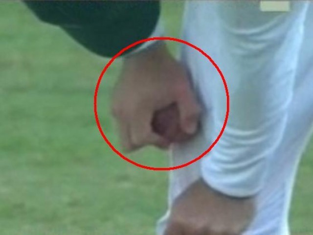 a screengrab showing the south african bowler tampering the ball