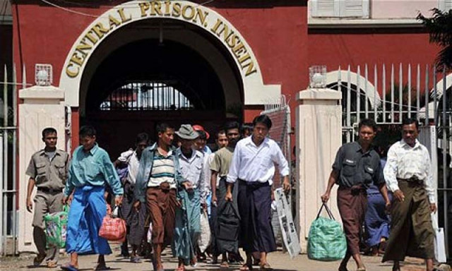 myanmar prisoners walk out of the insein central prison in yangon photo afp