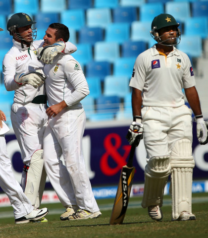 bowler dean elgar c of south africa celebrates with wicketkeeper ab de villiers after taking the wicket of pakistan 039 s captain during the fourth day of the second test cricket match between pakistan and south africa in dubai on october 26 2013 photo afp bowler dean elgar c of south africa celebrates with wicketkeeper ab de villiers after taking the wicket of pakistan 039 s captain during the fourth day of the second test cricket match between pakistan and south africa in dubai on october 26 2013 photo afp