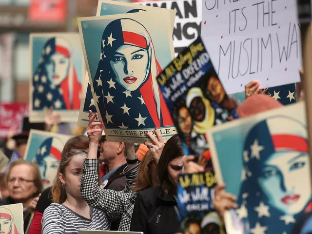 people take part in a rally called i am muslim too in times square manhattan new york city on february 19th photo reuters people take part in a rally called i am muslim too in times square manhattan new york city on february 19th photo reuters