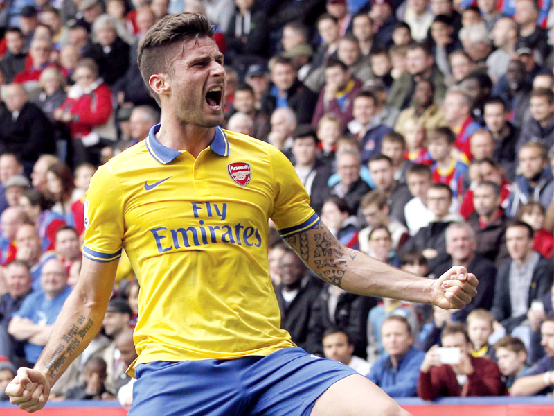 arsenal edged crystal palace 2 0 at selhurst park yesterday to maintain a two point lead at the premier league summit photo afp