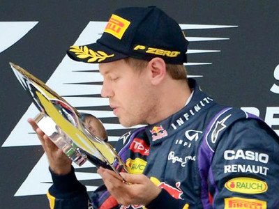 vettel scorches to lap record seizes indian gp pole