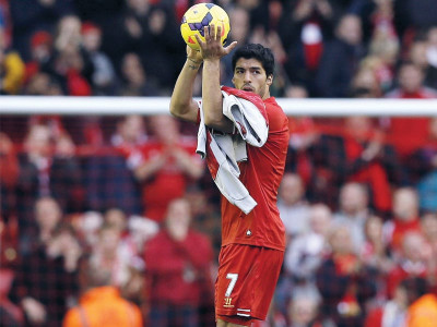 english premier league suarez hat trick keeps liverpool on arsenal s tail english premier league suarez hat trick keeps liverpool on arsenal s tail