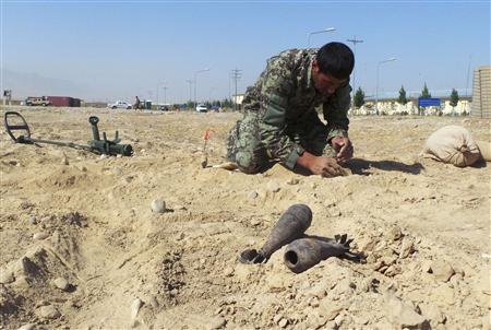 a file photo of an afghan army soldier from an improvised explosive devices ied school performs a demonstration in mazar e sharif in northern afghanistan photo reuters