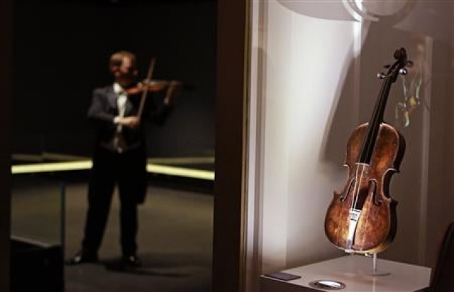 the violin that belonged to titanic bandmaster wallace hartley is seen on display at the titanic centre in belfast photo reuters the violin that belonged to titanic bandmaster wallace hartley is seen on display at the titanic centre in belfast photo reuters