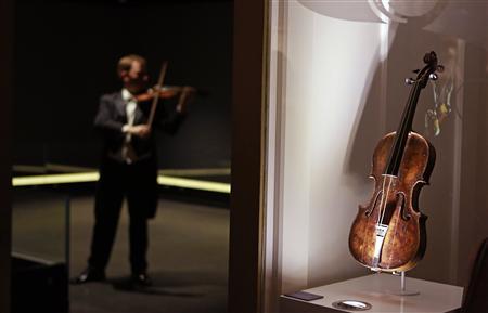the violin that belonged to titanic bandmaster wallace hartley is seen on display at the titanic centre in belfast photo reuters