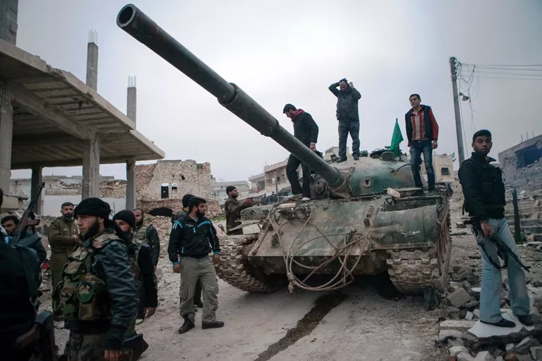 syrian rebels gather around a t 72 tank captured from government forces photo afp syrian rebels gather around a t 72 tank captured from government forces photo afp