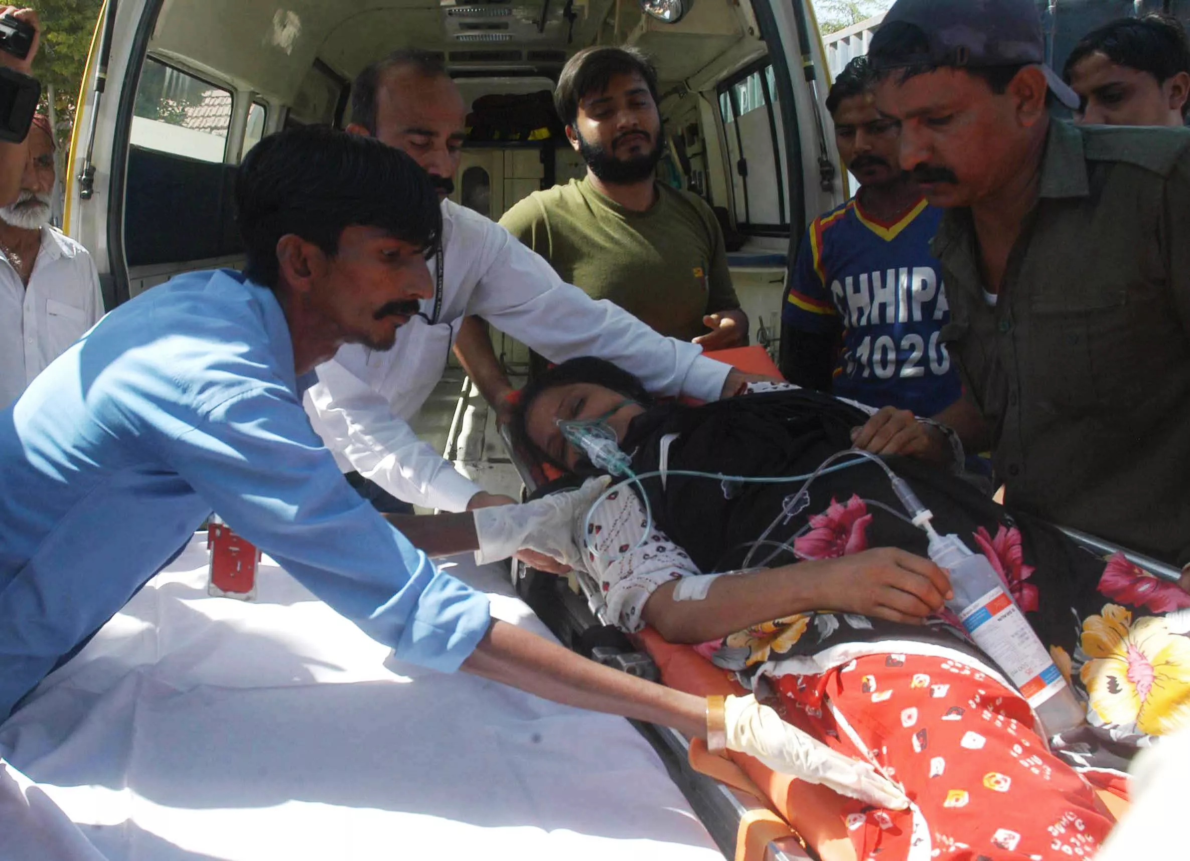 rescue and paramedical workers shift an unconcious woman from an ambulance on to a stretcher at the jpmc hospice in karachi photo rashid ajmeri express rescue and paramedical workers shift an unconcious woman from an ambulance on to a stretcher at the jpmc hospice in karachi photo rashid ajmeri express