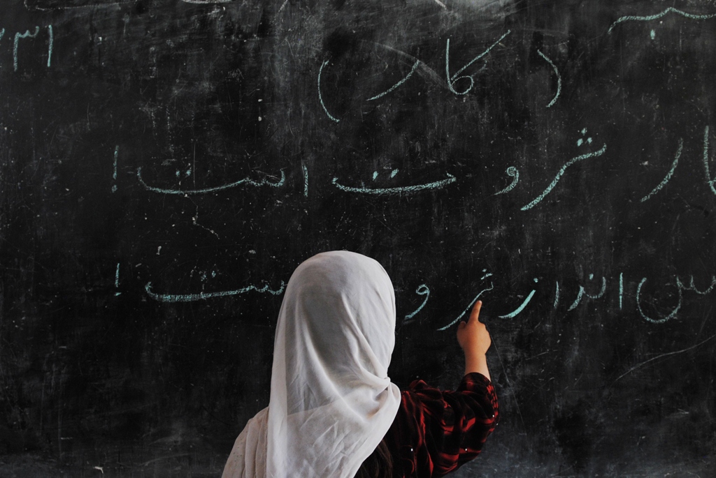 file photo of a girl writing on a blackboard photo afp