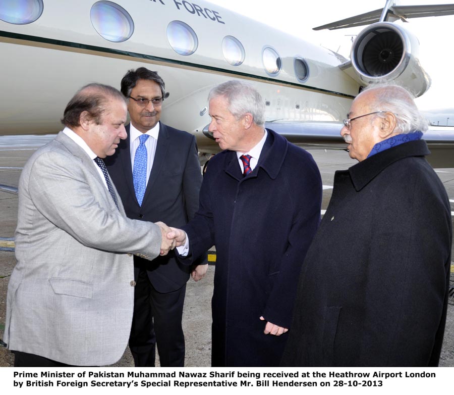 nawaz sharif being received by a representative of the british foreign secretary after his arrival in london photo pid