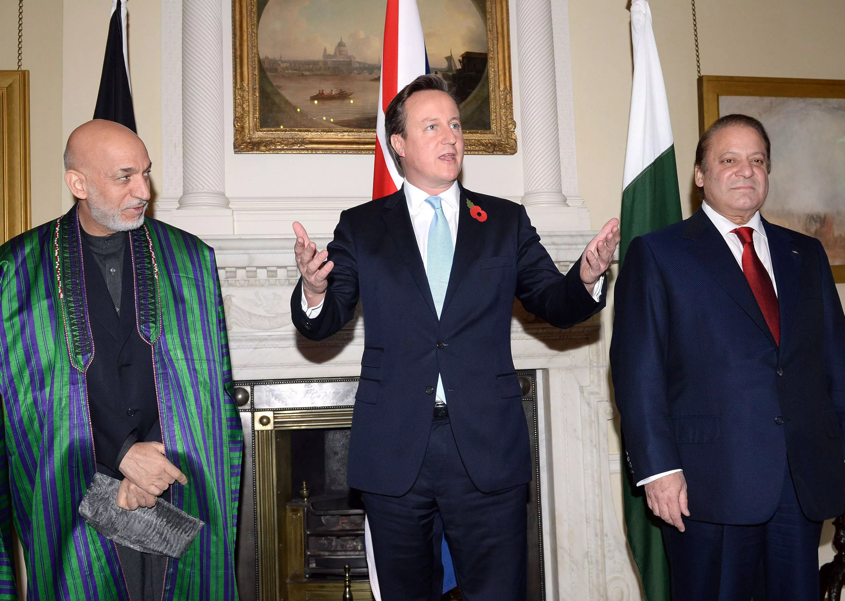 british prime minister david cameron c afghan president hamid karzai l and pakistani premier nawaz sharif r pose for a picture ahead of a trilateral meeting in downing street in london on october 29 2013 photo afp british prime minister david cameron c afghan president hamid karzai l and pakistani premier nawaz sharif r pose for a picture ahead of a trilateral meeting in downing street in london on october 29 2013 photo afp