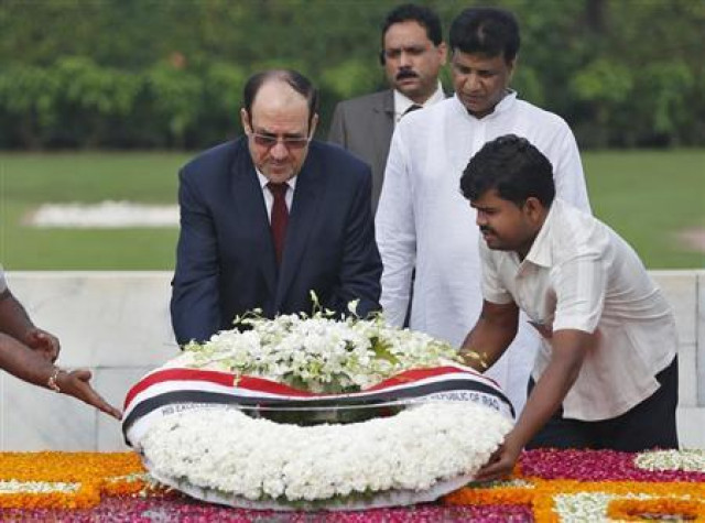 iraqi prime minister nuri al maliki l places a wreath at the mahatma gandhi memorial at rajghat in new delhi photo reuters iraqi prime minister nuri al maliki l places a wreath at the mahatma gandhi memorial at rajghat in new delhi photo reuters