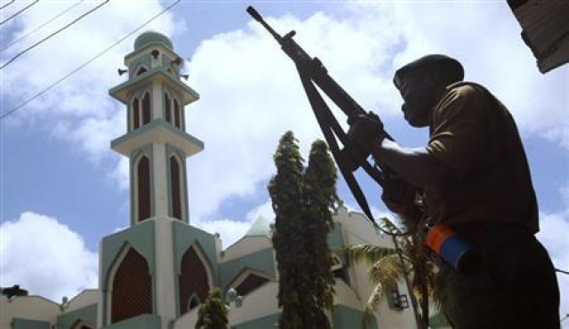 a police officer holds his position outside the masjid mussa mosque during an operation to to suppress demonstrators reacting to the killing of an muslim cleric at kenya 039 s coastal city of mombasa photo reuters a police officer holds his position outside the masjid mussa mosque during an operation to to suppress demonstrators reacting to the killing of an muslim cleric at kenya 039 s coastal city of mombasa photo reuters