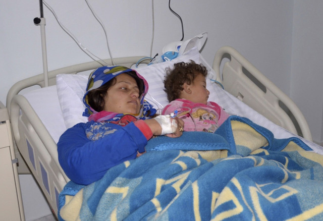 a file photo of a woman and a child injured in what the us government said was a chemical weapons attack being treated at a hospital in the city of aleppo in syria photo reuters a file photo of a woman and a child injured in what the us government said was a chemical weapons attack being treated at a hospital in the city of aleppo in syria photo reuters