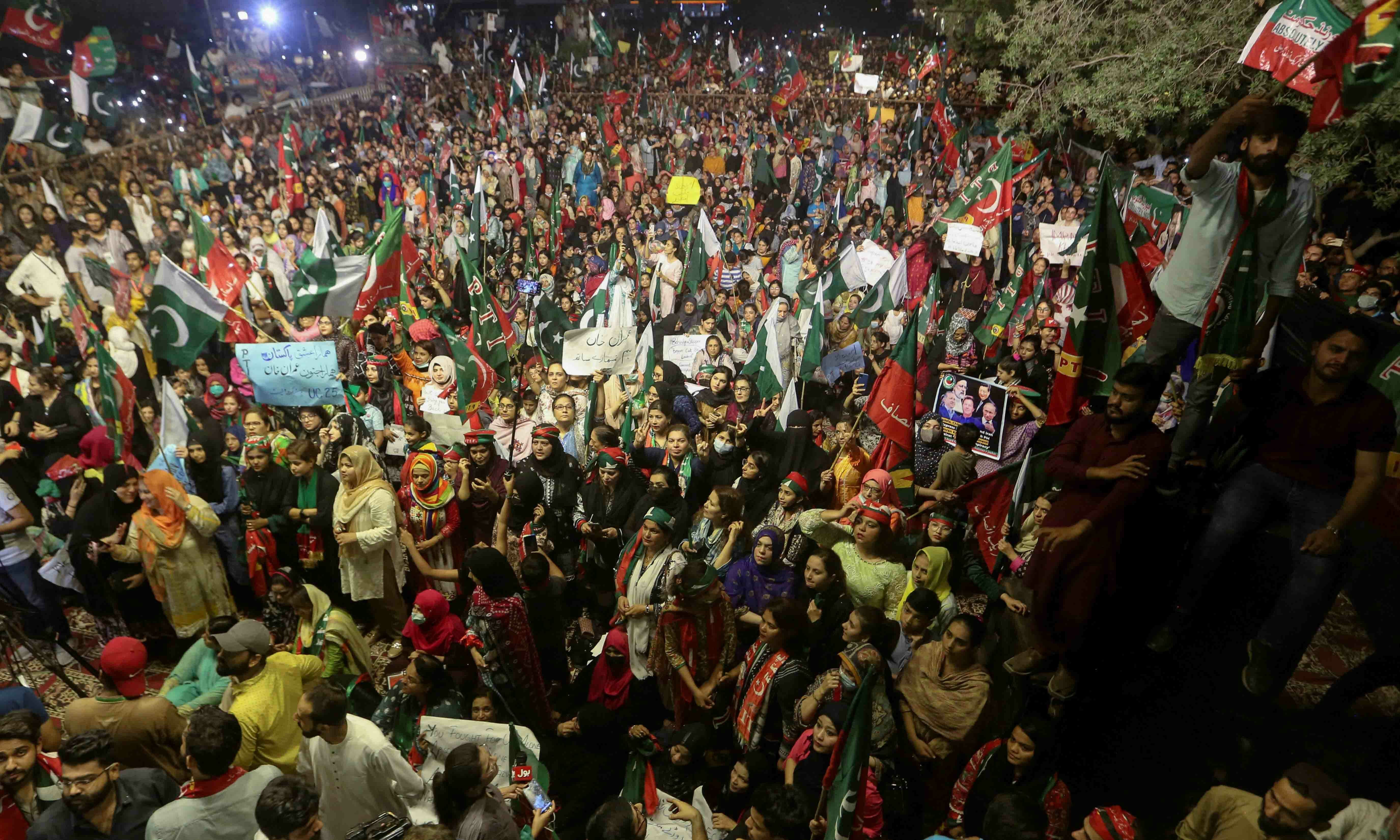 PTI supporters rally in support of former prime minister Imran Khan in Karachi on April 10. REUTERS