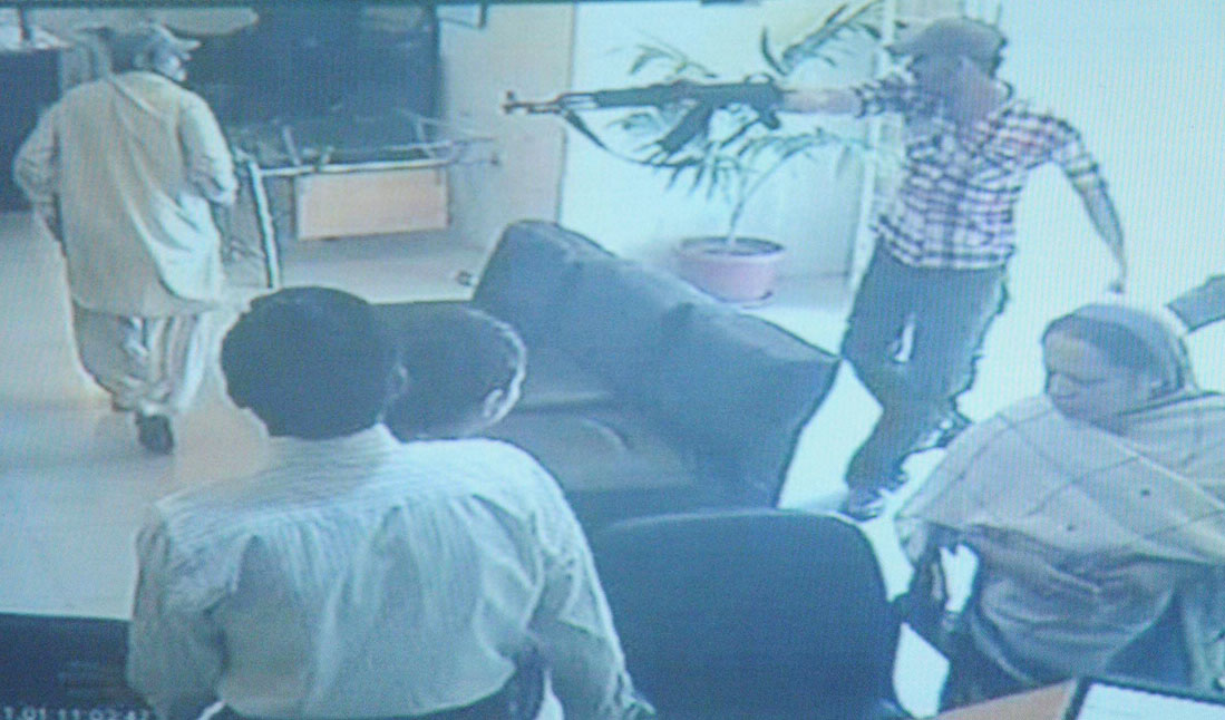 a grab from the cctv footage of a bank robbery in progress in ubl 039 s paposh nagar branch in karachi photo mohammad noman express