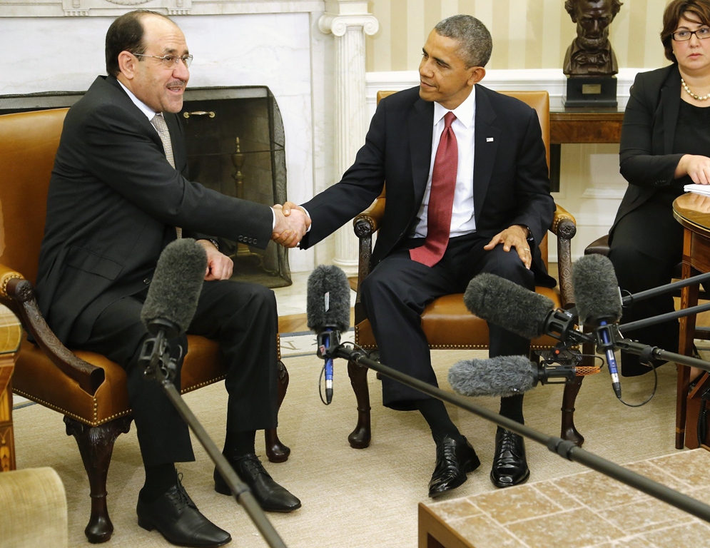u s president barack obama r shakes hands with iraqi prime minister nuri al maliki l after their meeting in the oval office at the white house in washington november 1 2013 photo reuters