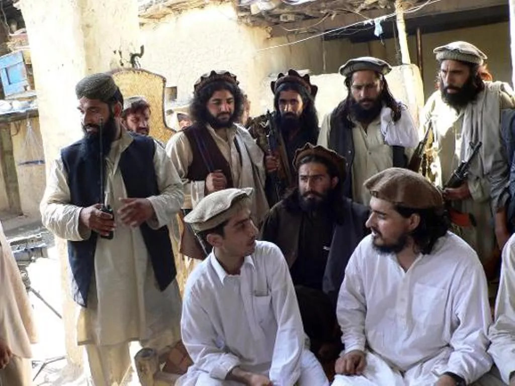 late hakimullah mehsud bottom right surrounded by his close aides photo afp late hakimullah mehsud bottom right surrounded by his close aides photo afp