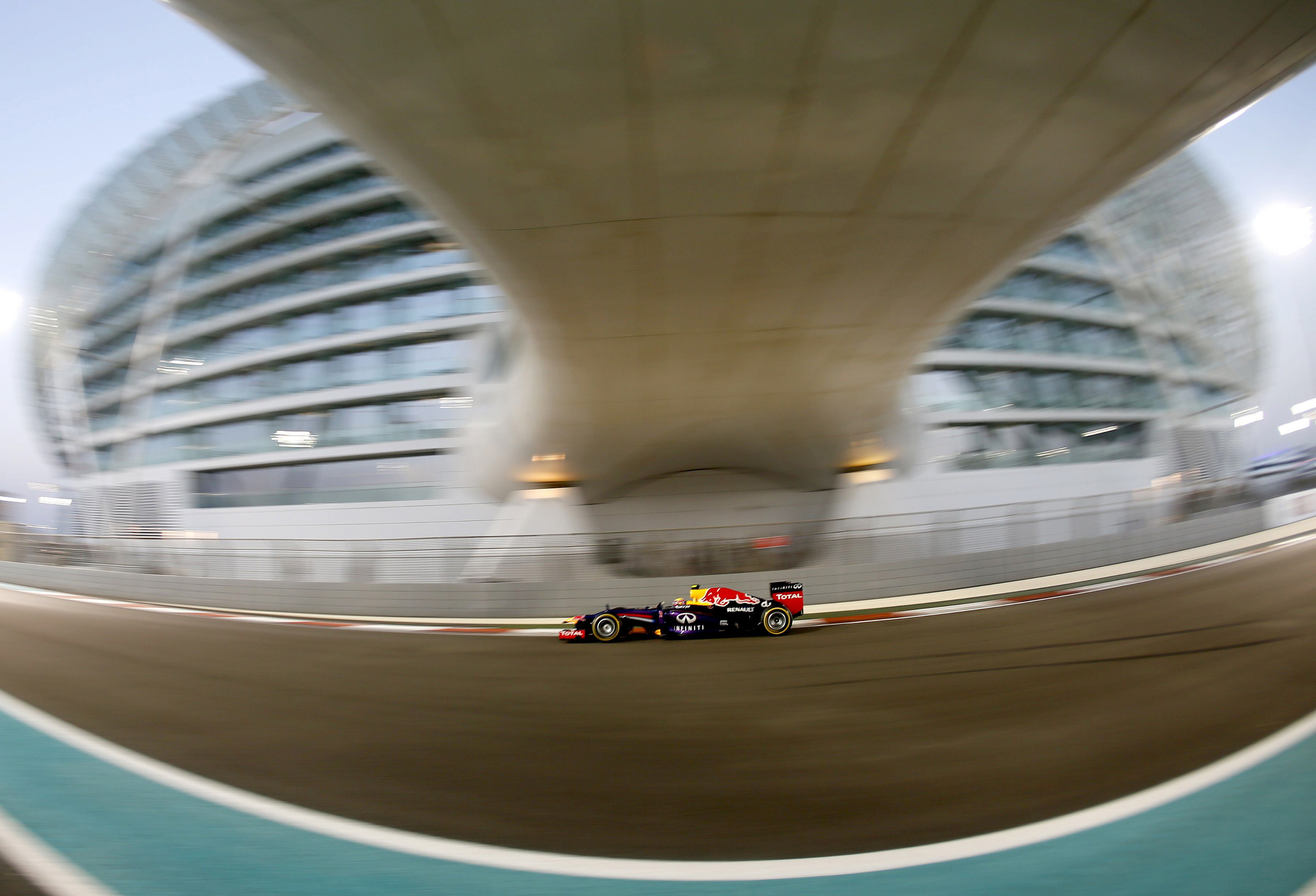 red bull racing 039 s australian driver mark webber drives during the qualifying session at the yas marina circuit in abu dhabi on november 2 2013 ahead of the abu dhabi formula one grand prix photo afp