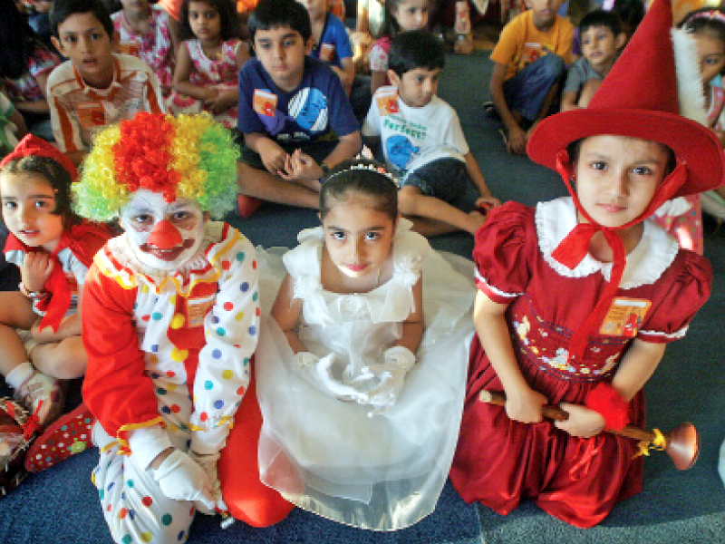 children attended the opening of the young readers den on saturday dressed as popular characters from storybooks such as little red riding hood and spiderman photo athar khan express