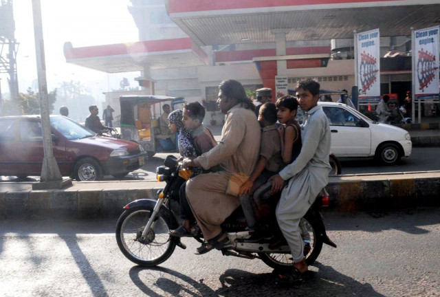 triple riding on motorcycles is illegal photo express file