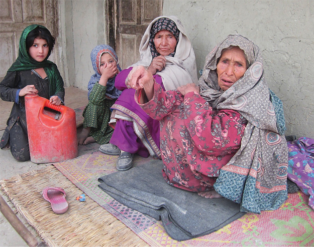 sakina bibi lives in makeshift tents gripped in a perpetual fear of remaining homeless and dependent on aid for the rest of her life along with her family including her grandchildren photo shabbir mir express