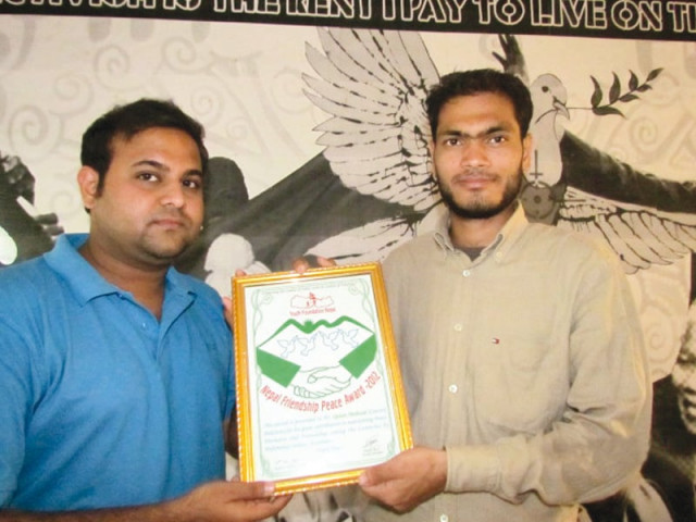 qaiser shahzad won the nepal friendship peace award for his draft for european union inspired south asian union model at a ceremony held in kathmandu last week photo courtesy youth foundation nepal