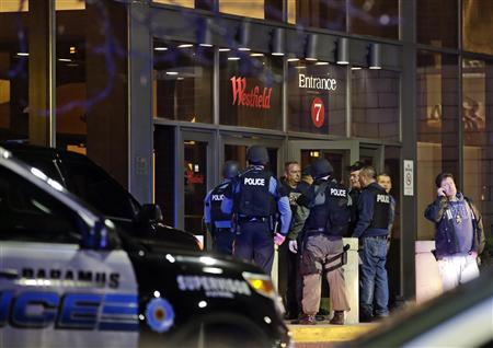 heavily armed police secure the area after reports that a gunman fired shots at the garden state plaza mall in paramus new jersey photo reuters