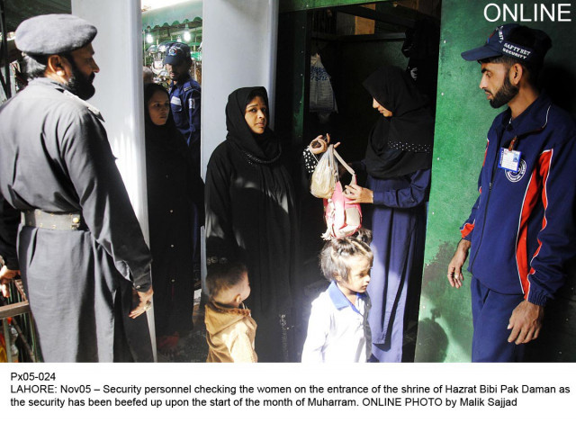 security personnel screen devotees arriving at the hazrat bibi pak daman shrine in lahore on tuesday as security is beefed for muharram photo online