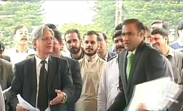 screengrab of minister of state for water and power sher abid ali l trying to convince aitzaz ahsan r to enter the parliament screengrab of minister of state for water and power sher abid ali l trying to convince aitzaz ahsan r to enter the parliament
