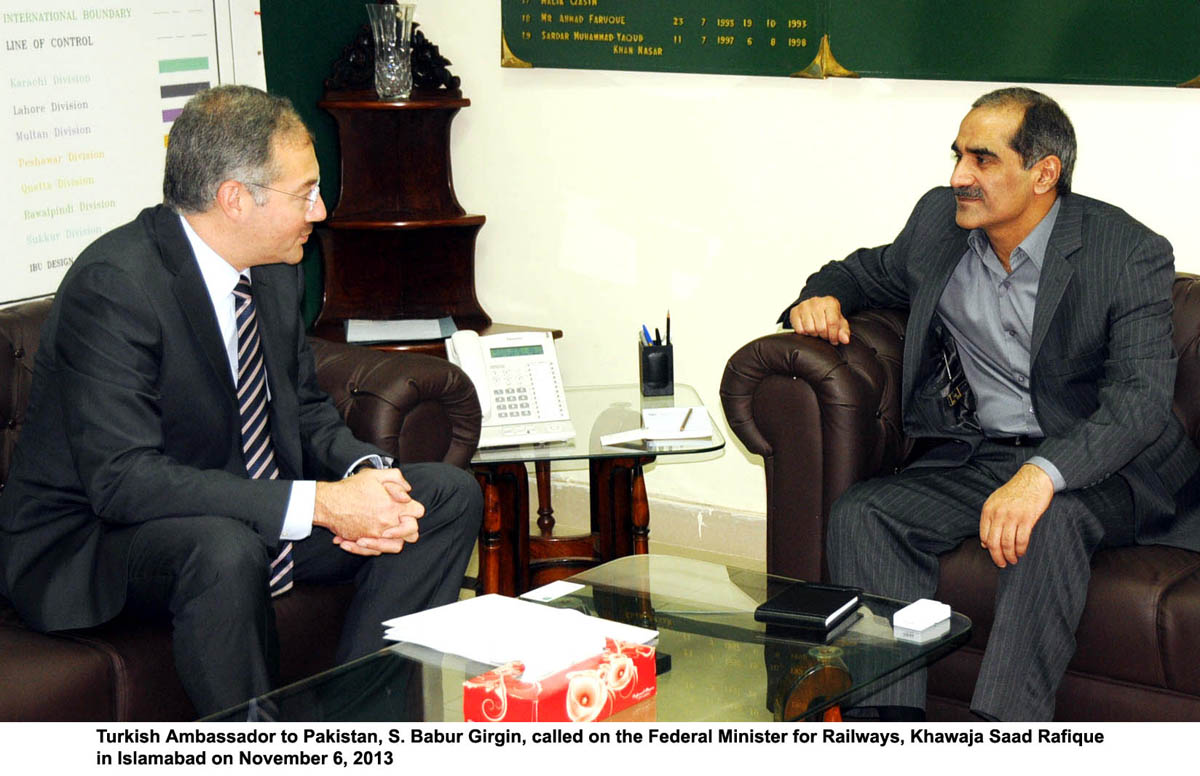 federal railways minister khwaja saad rafique r in a meeting with the turkish ambassador babur girgin l photo pid