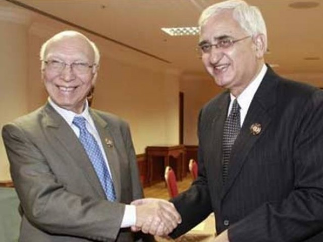 indian external affairs minister salman khurshid and advisor to prime minister on national security sartaj aziz photo radio pakistan