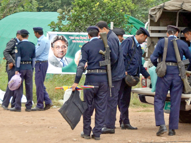 police officials going back after finishing their duty outside the house of former president general retd pervez musharraf photo inp