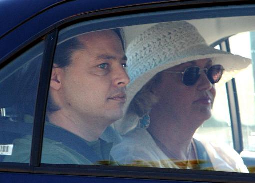 former guantanamo bay inmate david hicks l and an unidentified woman are driven away from adelaide 039 s maximum security yalata jail on december 29 2007 photo afp