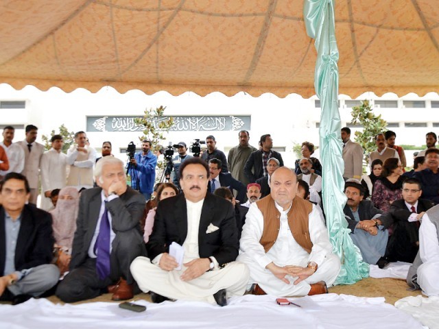 members of opposition in senate attending the protest session outside the parliament house on wednesday photo inp