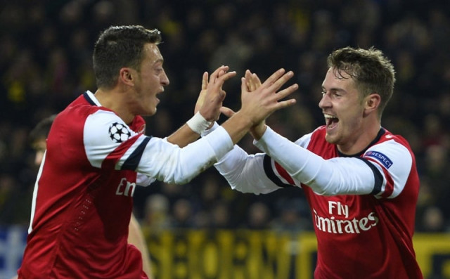 welsh midfielder aaron ramsey headed the crucial second half goal as arsenal avenged their 2 1 defeat at home to the germans a fortnight ago photo afp welsh midfielder aaron ramsey headed the crucial second half goal as arsenal avenged their 2 1 defeat at home to the germans a fortnight ago photo afp