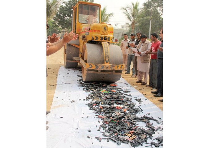 hundreds of toy guns were destroyed by pursukoon on thursday as part of their project against deweaponisation hatyar nahi pyar love not weapons photo ayesha mir express hundreds of toy guns were destroyed by pursukoon on thursday as part of their project against deweaponisation hatyar nahi pyar love not weapons photo ayesha mir express