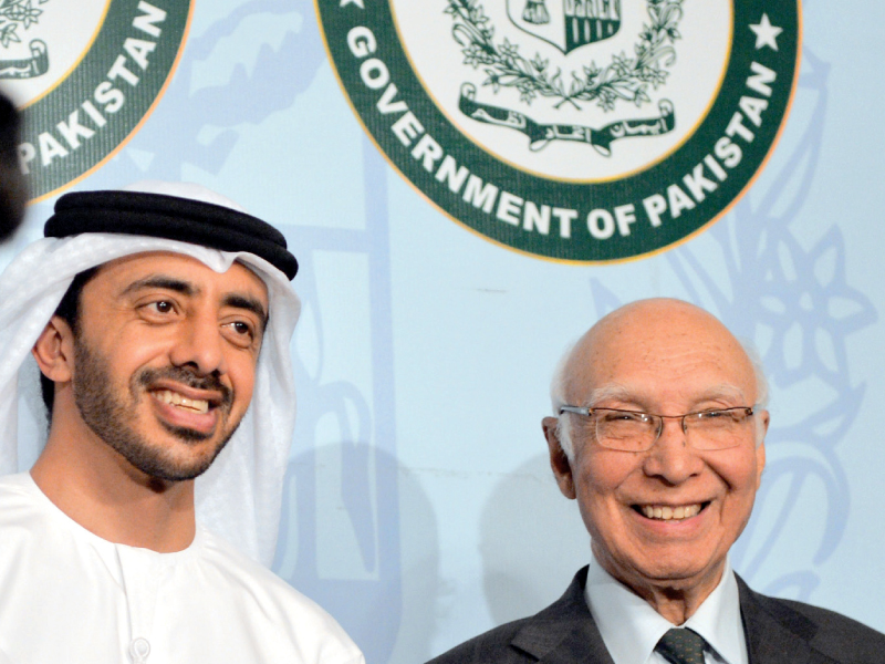 uae foreign minister l and pm s adviser r at a joint press conference photo afp