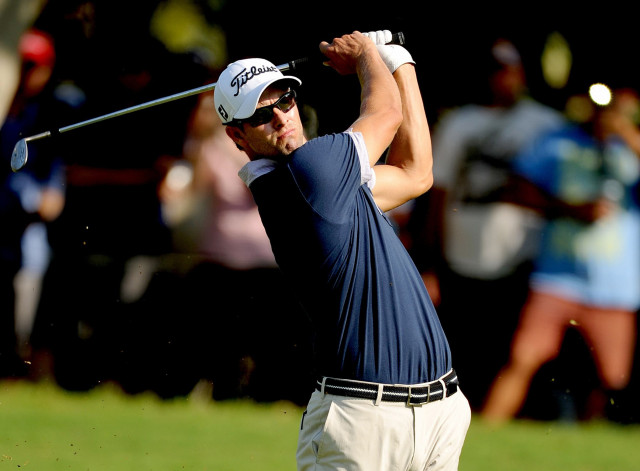 this handout photo taken and received from oneasia on november 9 2013 shows adam scott of australia playing a shot during the third round of the australian pga championship at the racv royal pines resort golf club on australia s gold coast photo afp this handout photo taken and received from oneasia on november 9 2013 shows adam scott of australia playing a shot during the third round of the australian pga championship at the racv royal pines resort golf club on australia s gold coast photo afp