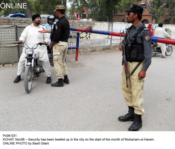 police officials man a check post in kohat as security is beefed up for muharram photo online police officials man a check post in kohat as security is beefed up for muharram photo online