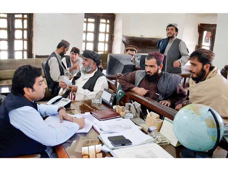 aspiring candidates submit their nomination papers to a returning officer in chaman photo inp