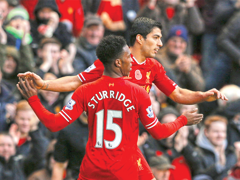 liverpool were in full flow as they ran riot against fulham beating them 4 0 at anfield on saturday photo reuters