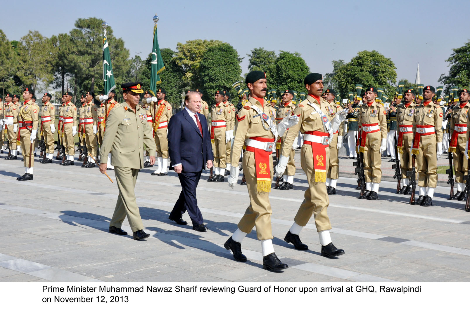 chief of army staff general ashfaq pervez kayani extreme l and prime minister nawaz sharif 2nd l inspect the guard of honour at the general headquarters in rawalpindi on tuesday photo pid