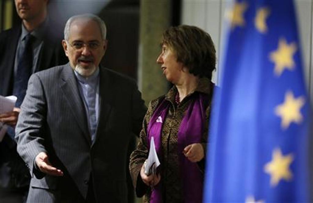 european union foreign policy chief catherine ashton r and iranian foreign minister mohammad javad zarif arrive at a news conference at the end of the iranian nuclear talks in geneva november 10 2013 photo reuters
