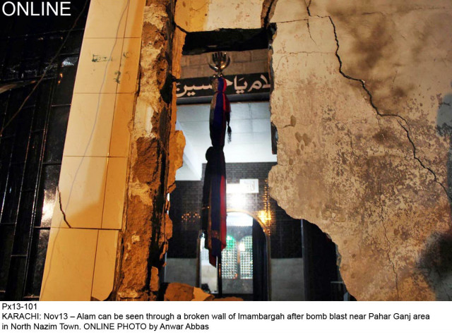 a view of the damaged wall of an imambargah near pahar ganj in karachi on wednesday evening photo online a view of the damaged wall of an imambargah near pahar ganj in karachi on wednesday evening photo online